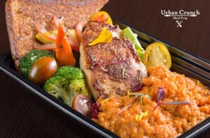 Lemon herb chicken breast with sweet potato puree and vegetables