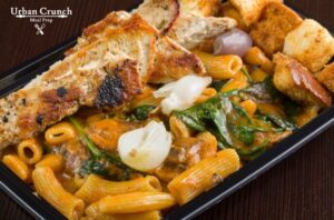 Penne pasta with boneless braised short ribs and pink sauce